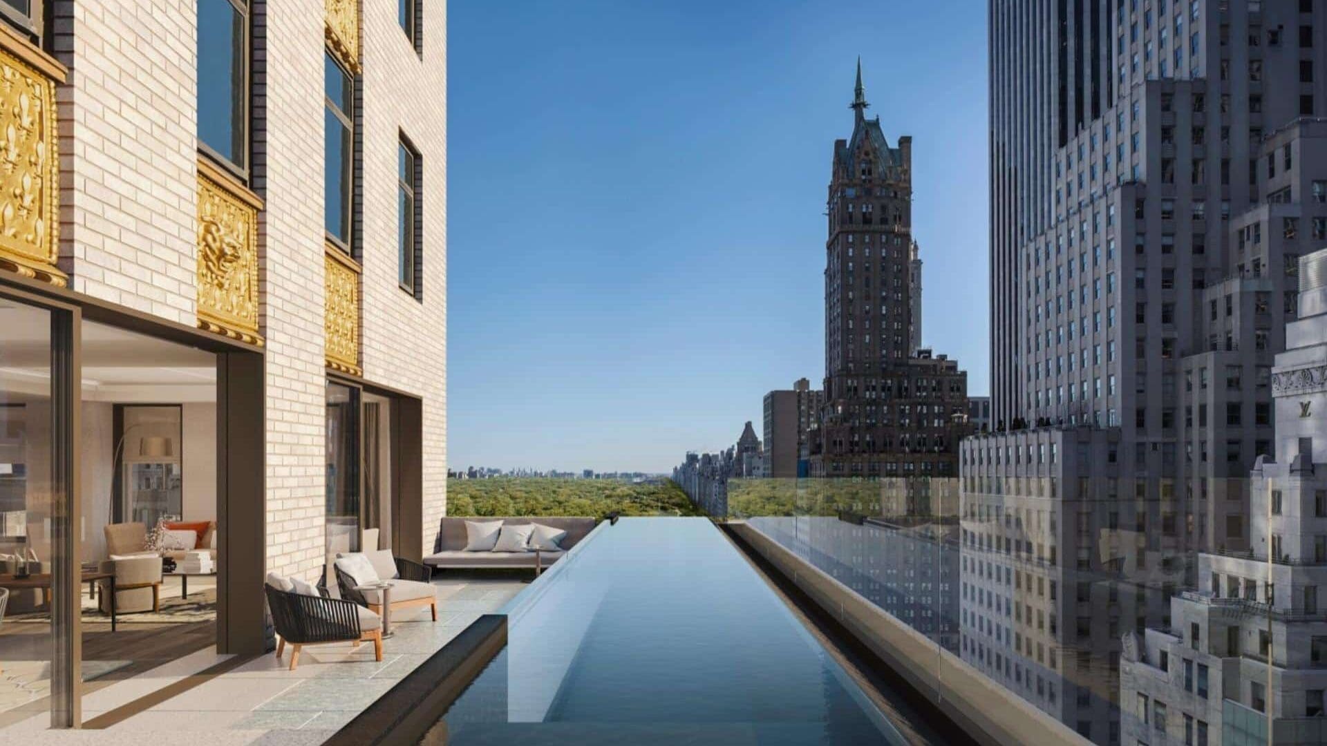Aman New York Hotel rooftop infinity pool overlooking Central Park with skyline views and minimalist terrace seating