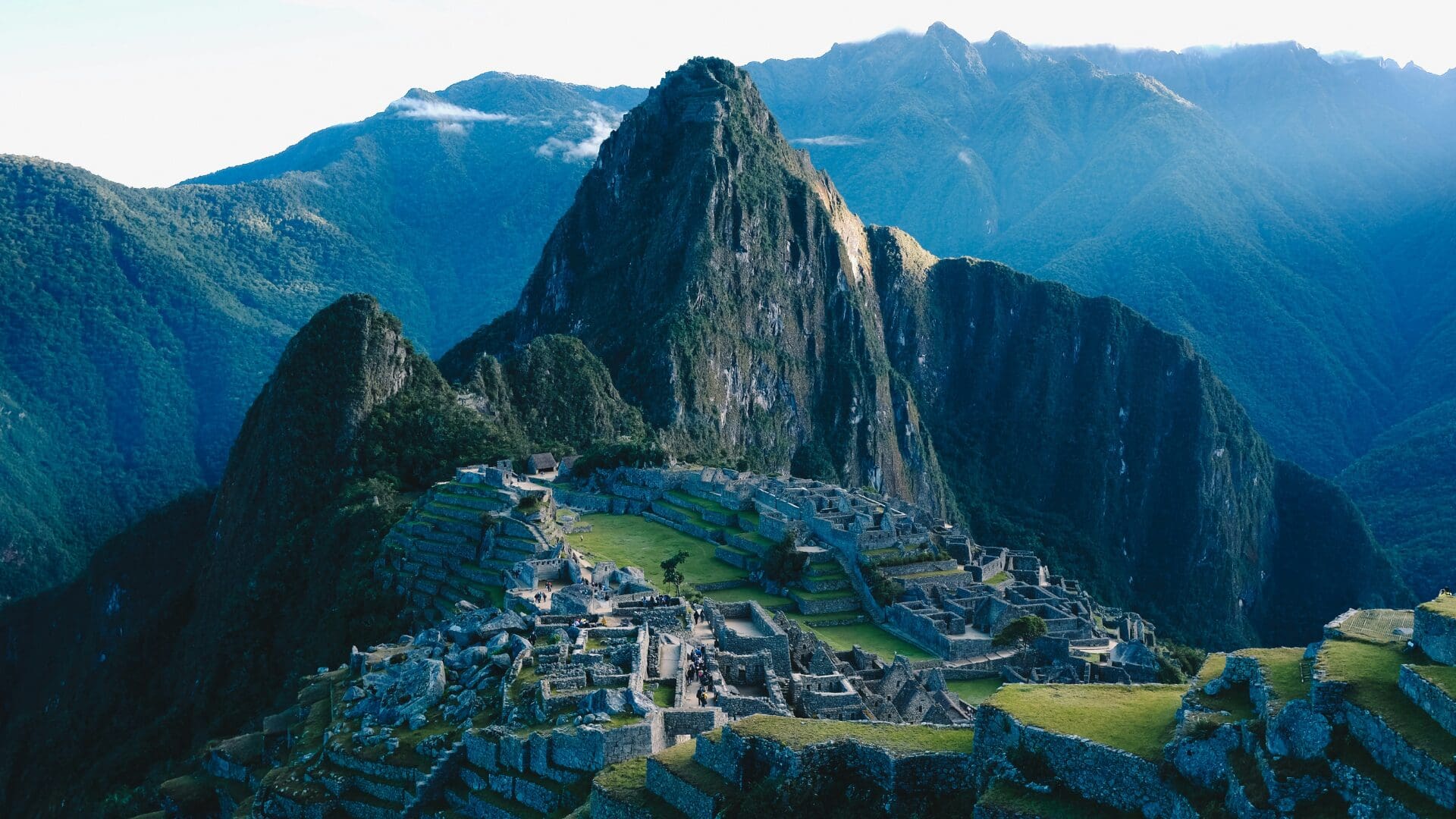 Machu Picchu ruins with mountain peaks in the Andes, Peru